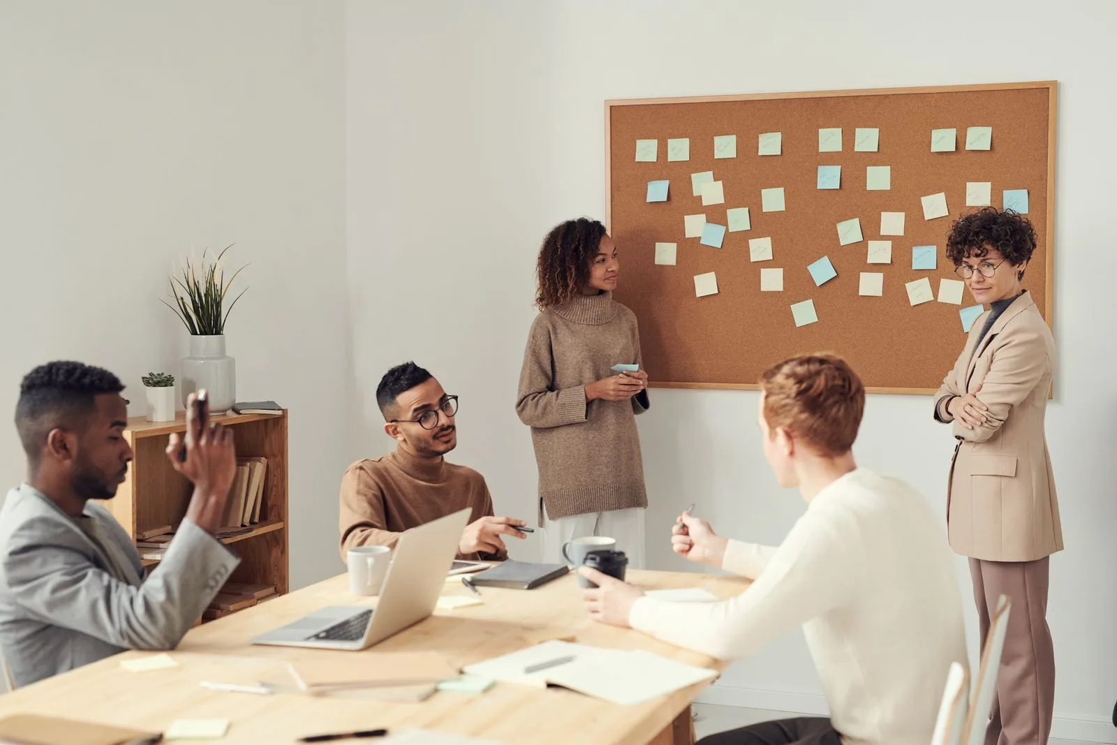 Chartered accountants collaborating in a professional client advisory meeting
